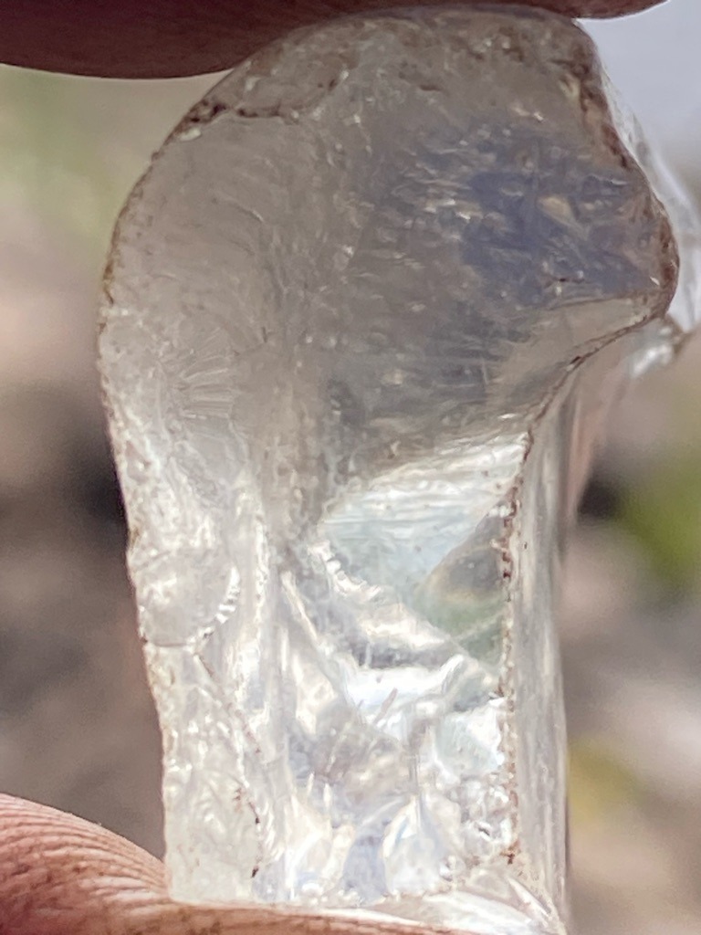 Natural rough stone (likely quartz or glass given the conchoidal fracture and surface texturing, requiring professional testing to rule out diamond) - Uncut raw crystal fragment / irregular rough form