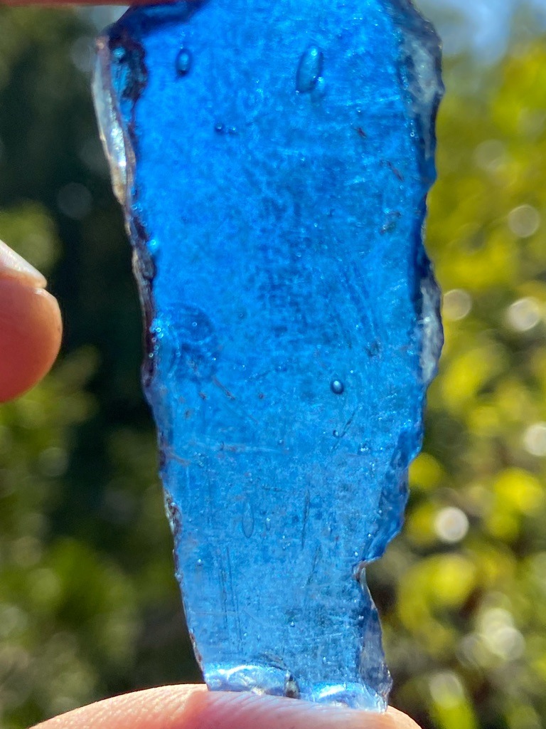 Not a diamond; this is a piece of blue glass, likely industrial or decorative cullet. - Irregular / Raw fragment