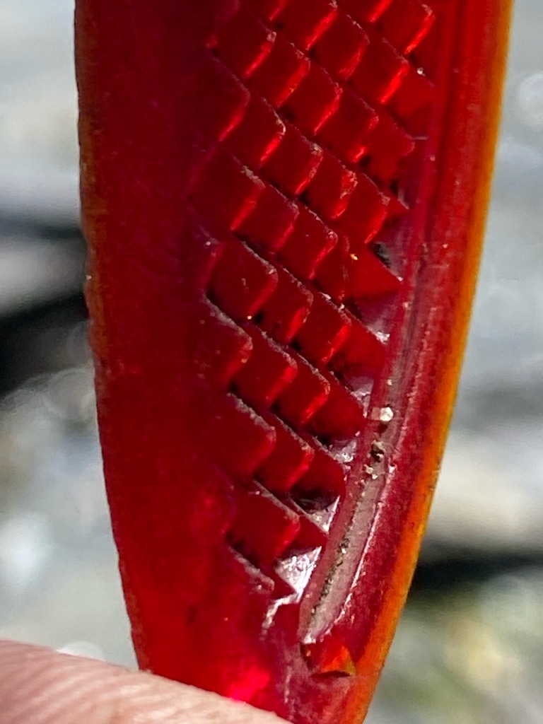 Not a diamond; this is a macro photograph of the inner surface and seeds of a ripe pomegranate (Punica granatum). - Irregular organic shape / Aril matrix