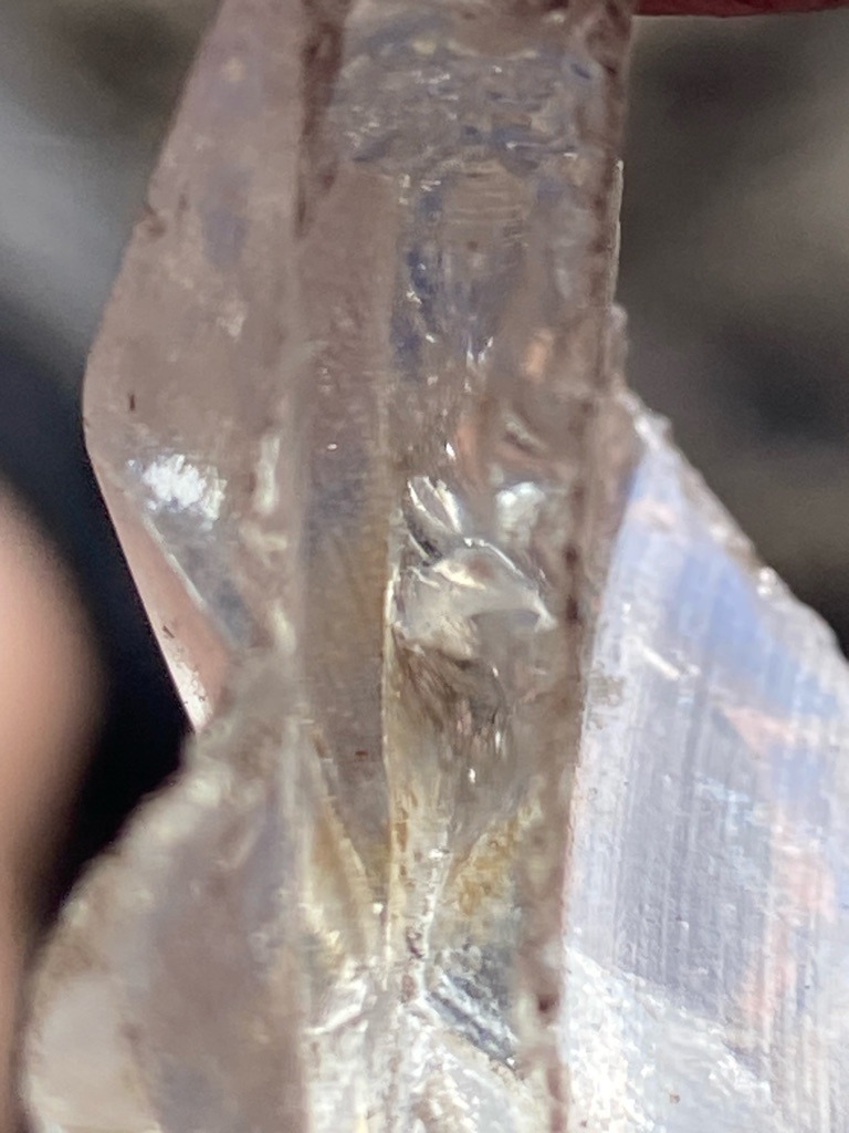 Natural rough mineral crystal (likely quartz or similar silicate rather than gem-quality diamond based on crystal habit and striations) - Rough uncut crystal / Irregular elongated fragment