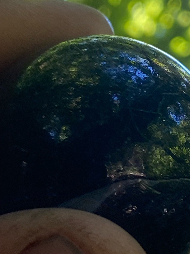 Not a diamond; likely Moldavite or a green tektite/glass - Irregular tumbled / rough nodule