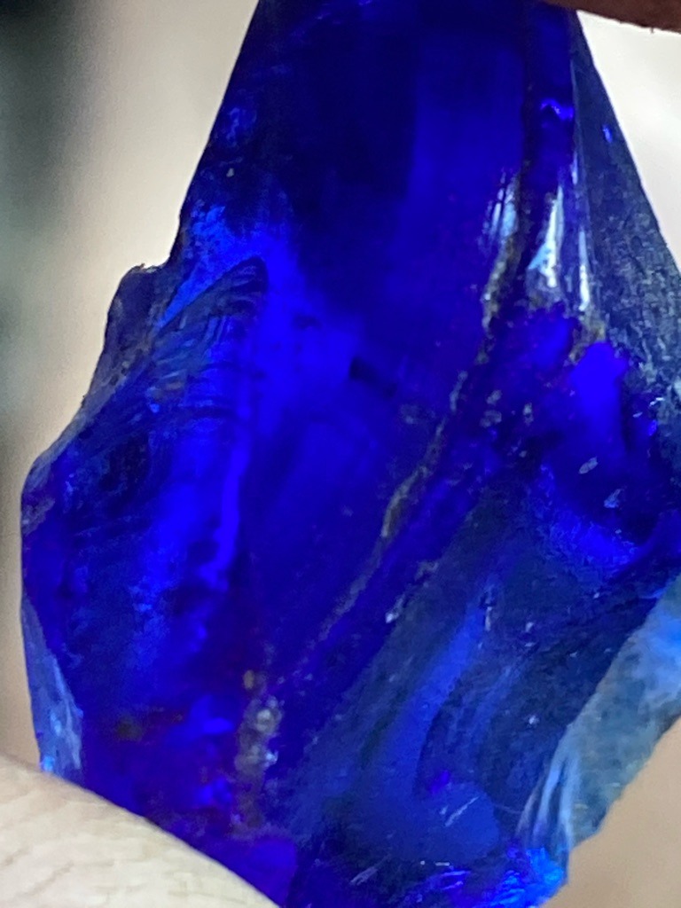 Not a diamond; this specimen appears to be a raw, unpolished, highly saturated blue gemstone, likely synthetic glass, cobalt-doped glass, or a low-grade rough blue mineral like sapphire/spinel (though optical features strongly suggest raw glass or quartz with color). - Rough / Raw Uncut Crystal / Irregular Nugget