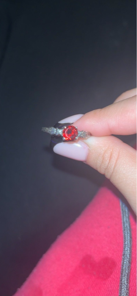 Natural Colored Diamond (or potentially treated red diamond) - Round Brilliant