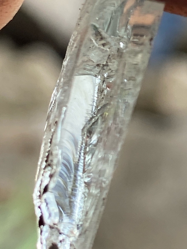 Rough, unsawn natural diamond crystal, likely industrial or near-gem quality - Rough octahedral/macle crystal form, elongated and distorted