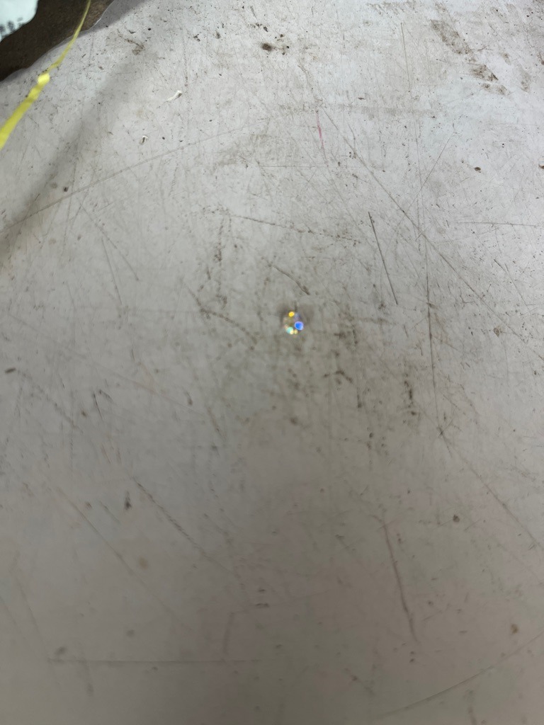 Cubic Zirconia or Synthetic Rhinestone (Small accent stone) - Round Brilliant