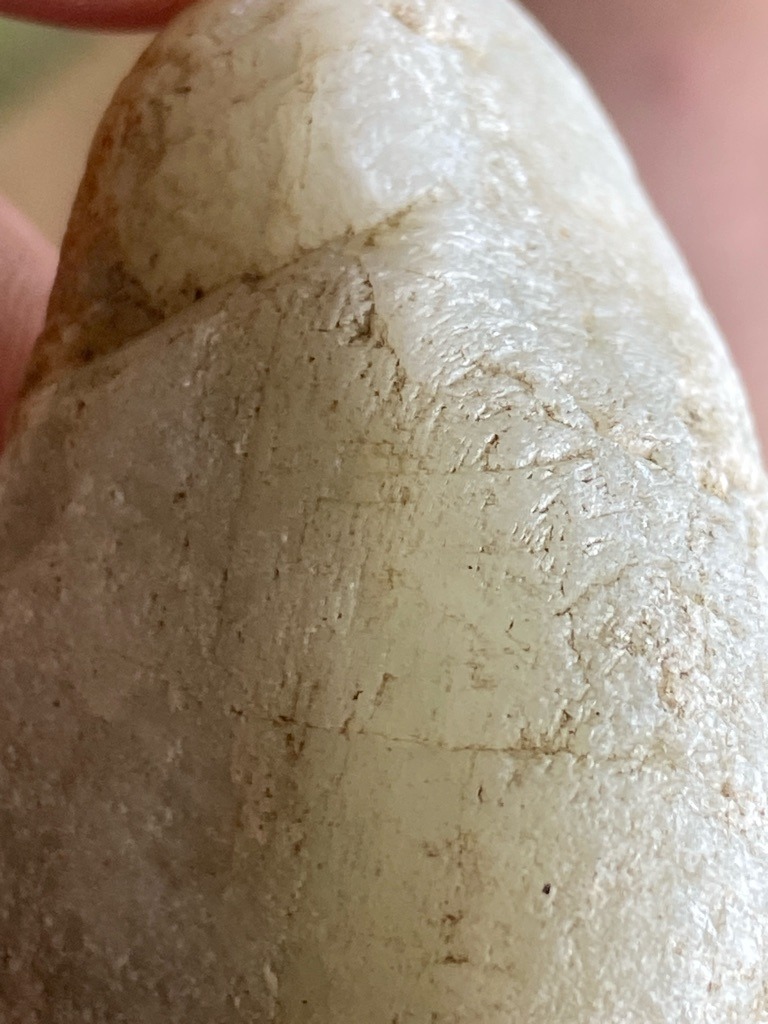 Not a diamond; appears to be a rough quartz, quartzite, or feldspar mineral pebble rather than gemstone-quality diamond rough. - Irregular / Natural Rough Pebble