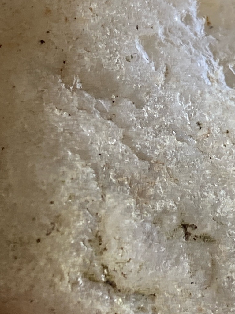 Natural rough mineral matrix, likely quartz or quartzite rather than a cut diamond based on texture and appearance - Rough unshaped crystalline aggregate