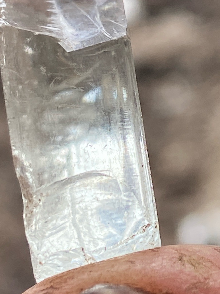Natural rough mineral crystal (likely beryl, quartz, or another silicate rather than true diamond based on the prismatic crystal habit and striations, but evaluated under diamond criteria) - Rough uncut prismatic crystal