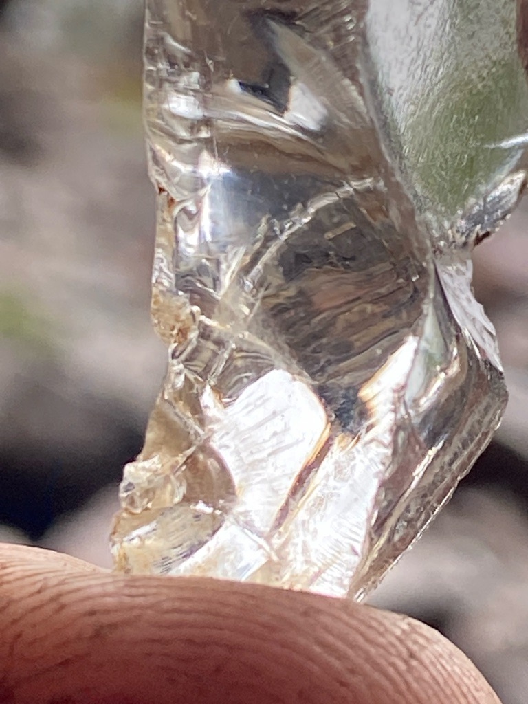 Not a diamond; this specimen appears to be raw quartz or glass slag based on the conchoidal fracture patterns and lack of crystal habit typical of rough diamond. - Raw / Uncut Fragment