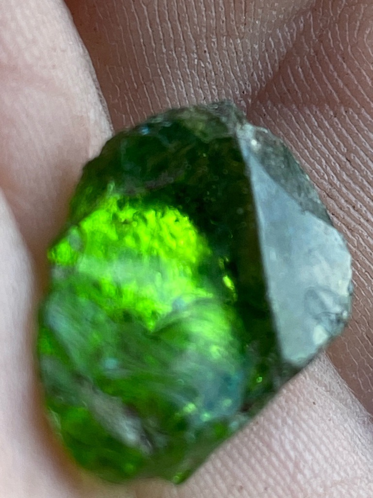 Natural rough green diamond (or potentially a green-colored gem mineral like rough emerald, tourmaline, or peridot given the intense coloration, but evaluated strictly as a rough crystal here) - Rough uncut crystal / Natural irregular octahedron or fragment