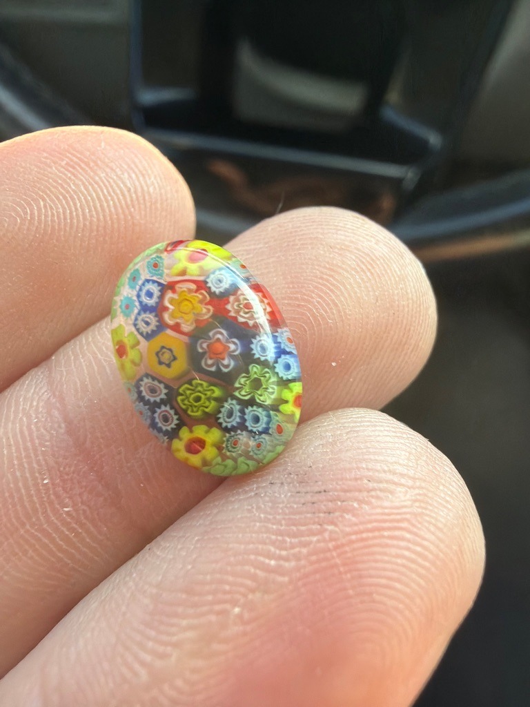 Not a diamond; this is a millefiori art glass cabochon. - Oval cabochon