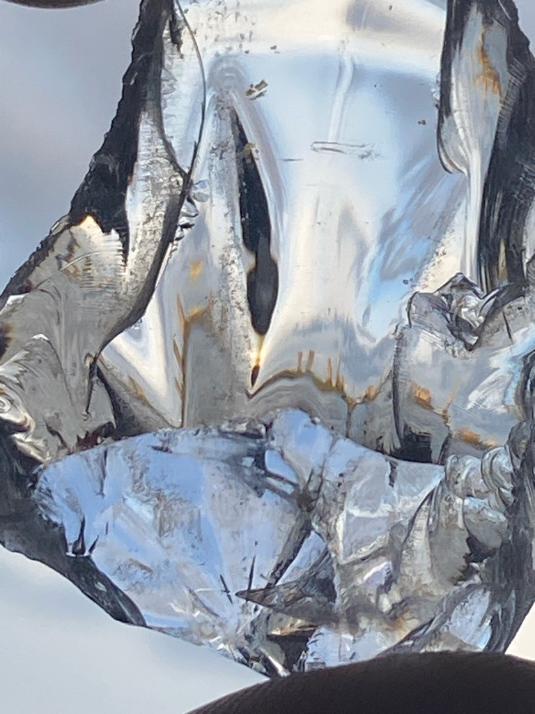 Not a gemological diamond; this appears to be a raw silicon or metallic crystal shard showing characteristic conchoidal fracture and metallic luster rather than standard diamond crystal habit. - Irregular raw crystal shard / Uncut fragment