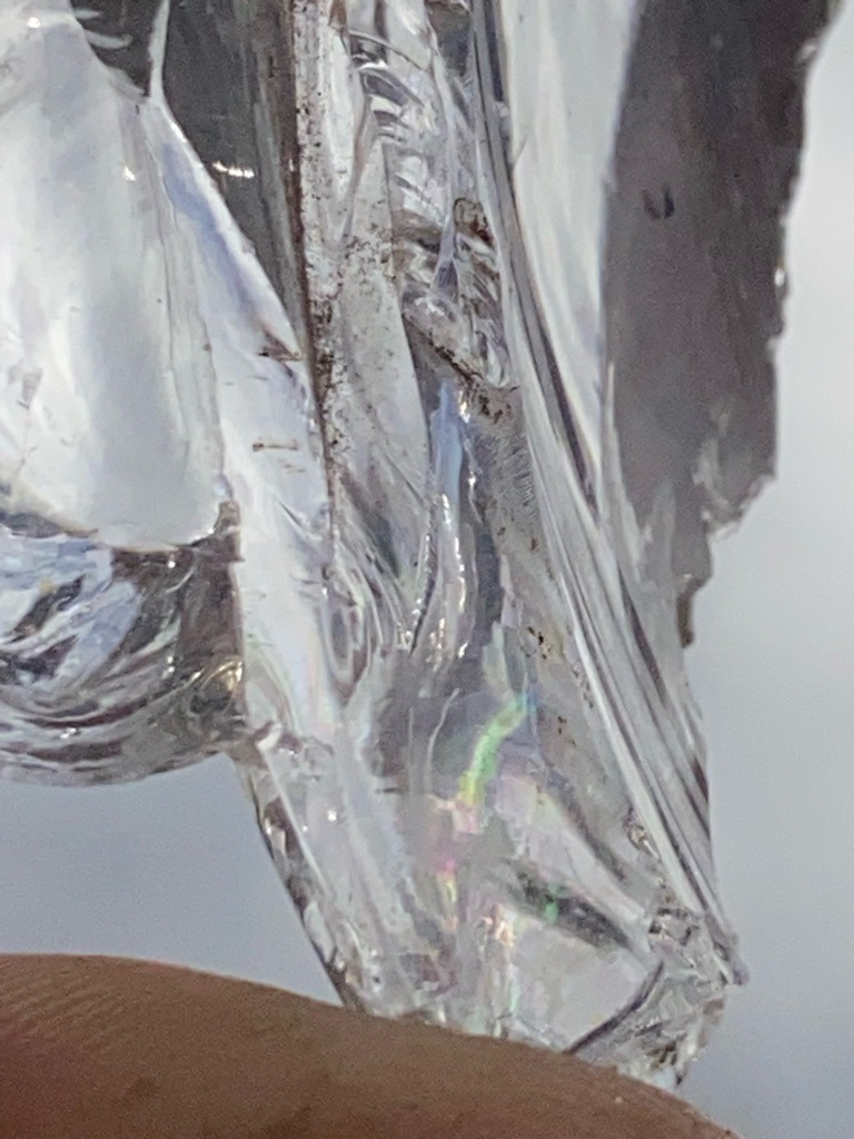 Indeterminate; appears to be an industrial-grade mineral fragment, possibly glass or quartz, rather than gem-quality diamond - Rough/Uncut (Amorphous fragment)
