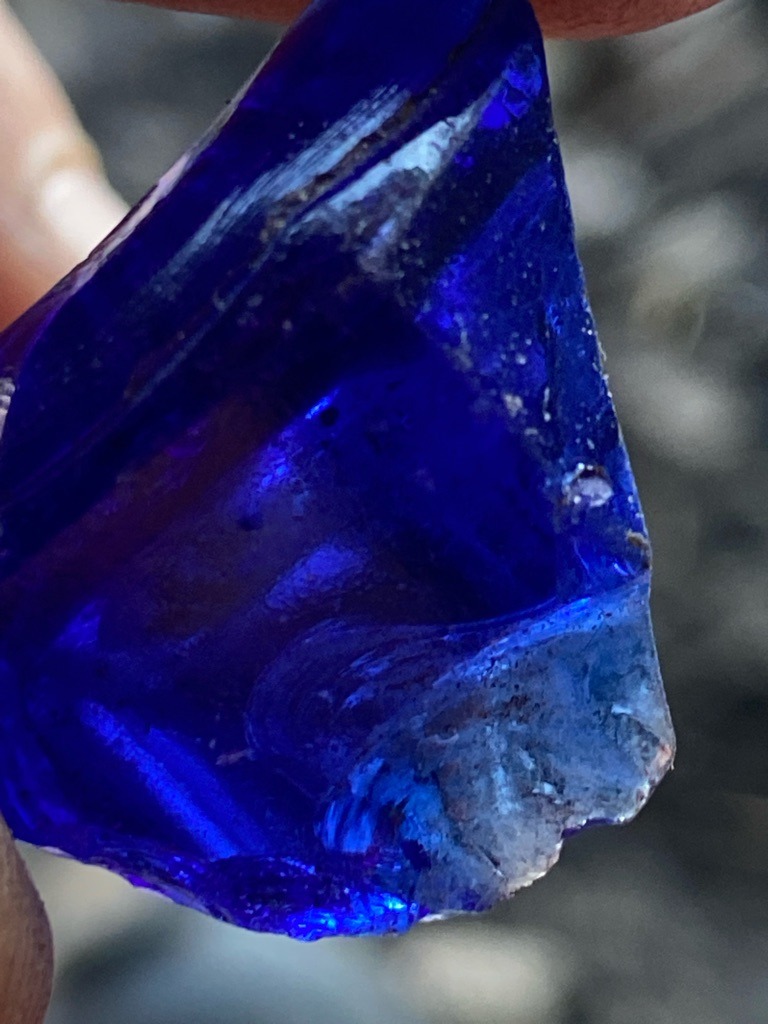 Not a diamond; this is a piece of cobalt blue glass (often found as slag glass or cullet) - Irregular raw chunk / rough fragment with conchoidal fractures