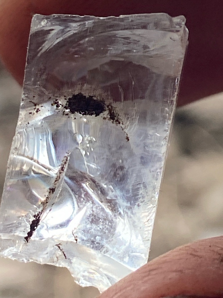 Rough, unpolished natural crystal (or potentially quartz/glass specimen, requiring physical testing, assuming rough diamond material for evaluation) - Rough crystal / tabular fragment with natural irregular habit