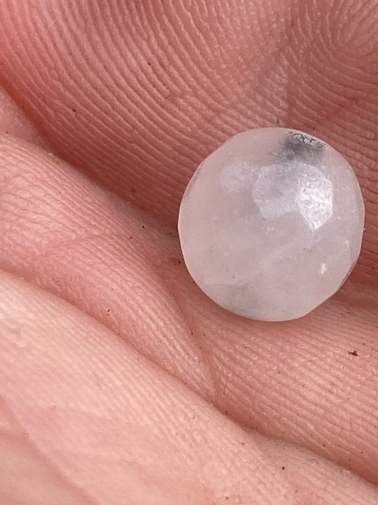 Cannot be confirmed visually; appears potentially as a rose-cut quartz, gemstone imitation, or non-diamond material due to surface texture and lustre, though professional laboratory testing is required to rule out heavily included industrial diamond. - Round (Rose-Cut style with a domed, faceted top)