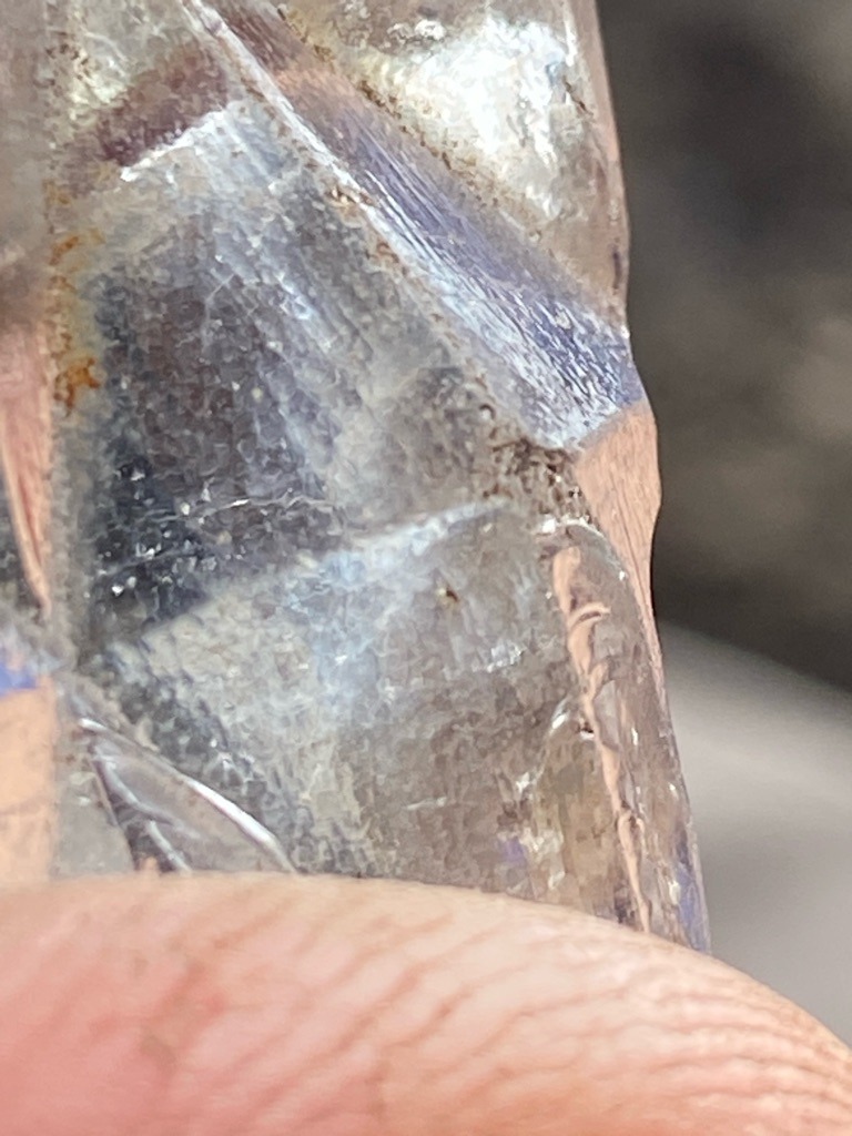 Not a diamond; appears to be raw or heavily included quartz crystal with surface weathering. - Rough crystal / Mineral specimen