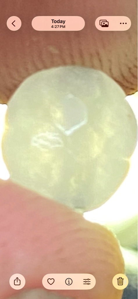 Not a diamond; visual characteristics strongly suggest a rough, translucent mineral or gemstone bead, potentially Jadeite or Quartz, rather than crystalline diamond. - Irregular tumbled or cabochon bead shape, non-faceted.