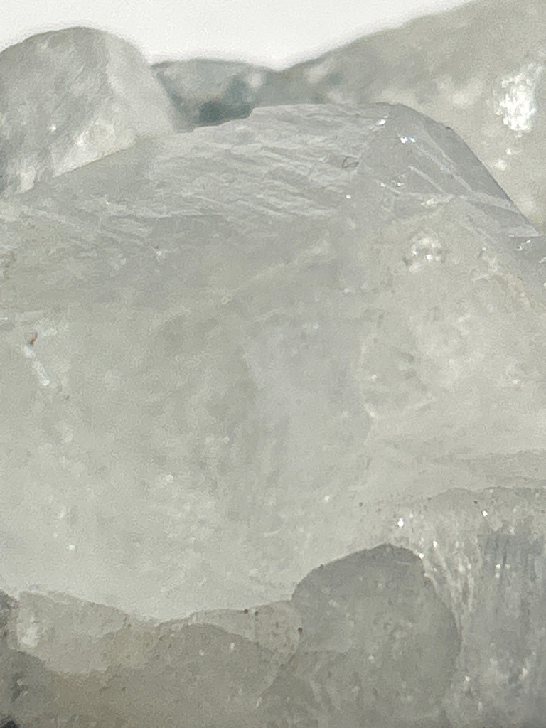 Natural rough diamond crystal - Rough octahedron with rounded edges