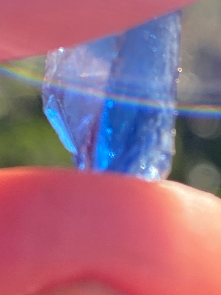 Natural rough crystal (likely colored corundum/sapphire or possibly blue diamond rough, though visually displays characteristics of a natural mineral crystal specimen) - Rough uncut crystal form