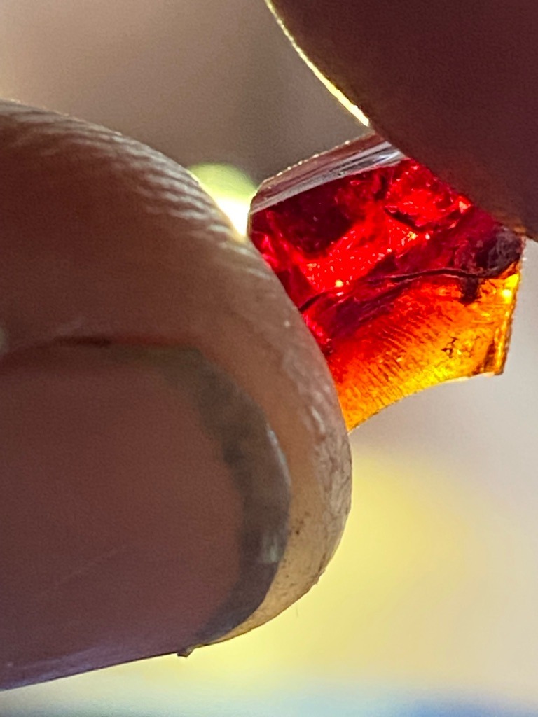 Natural Fancy Colored Diamond (likely Type Ia with nitrogen aggregation, though ruby/corundum or garnet cannot be entirely ruled out visually without gemological testing) - Rough crystal / Uncut gemstone fragment