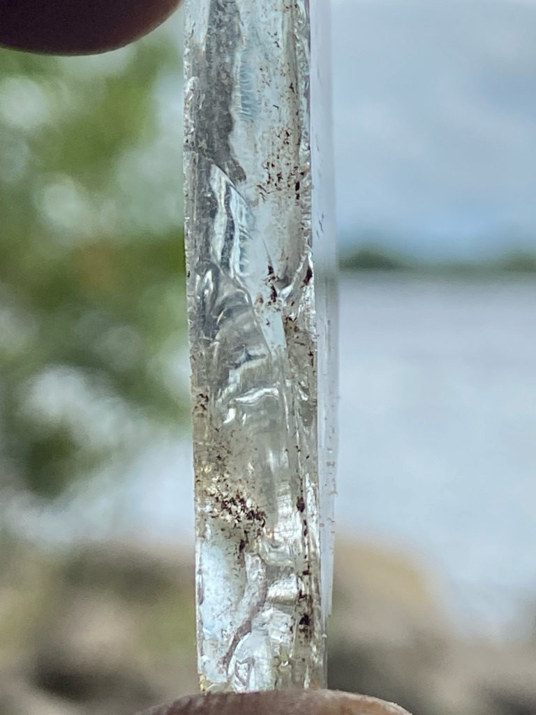 Not a diamond (likely industrial glass, quartz, or another mineral fragment) - Irregular raw fragment / unstructured shard