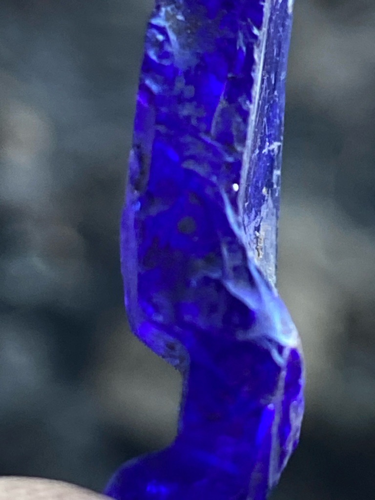 Not a diamond; appears to be synthetic or natural blue glass/slag - Irregular raw shard / rough fragment