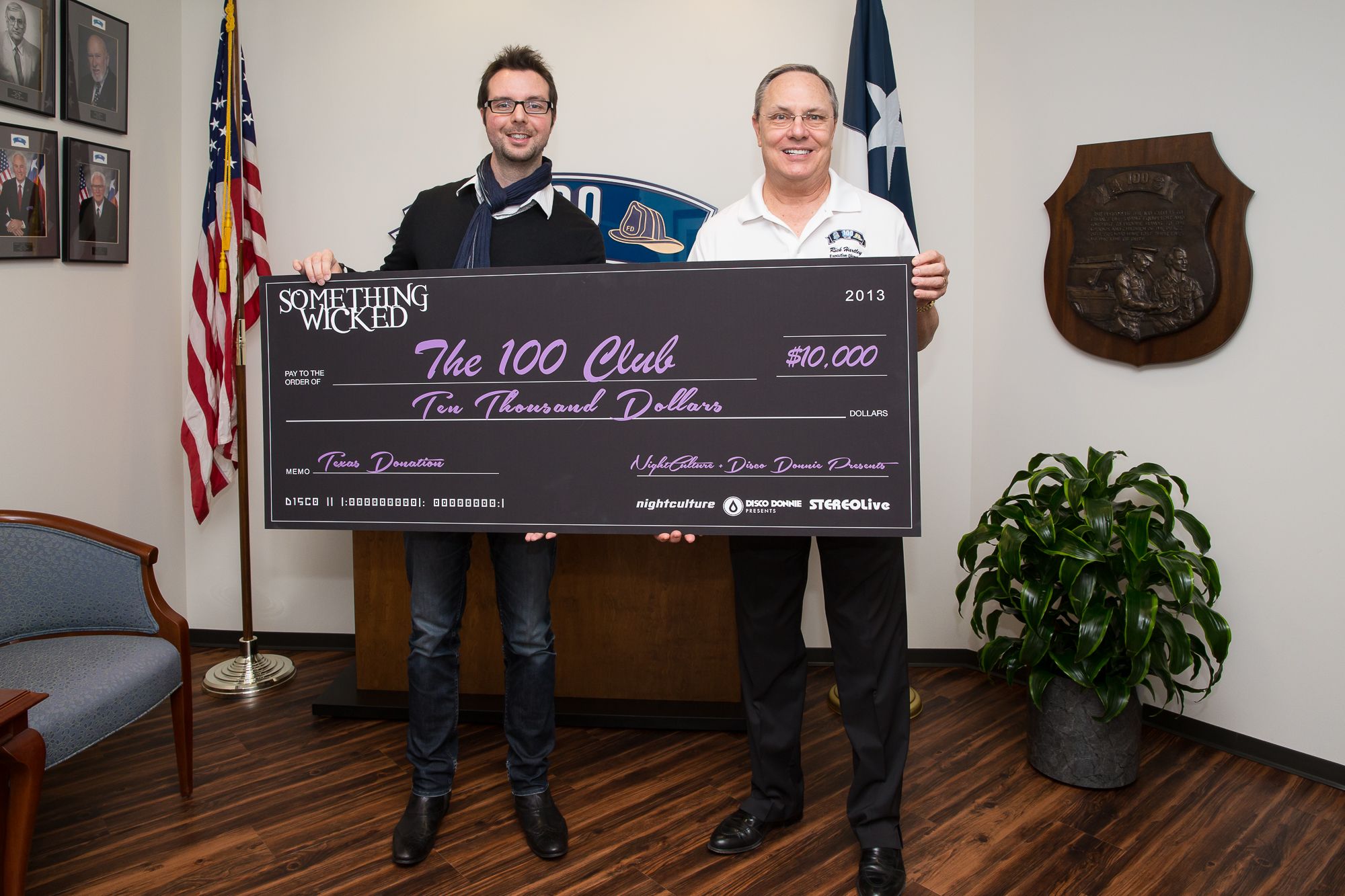 The 100 Club receives 10,000 donation from Something Wicked Festival.