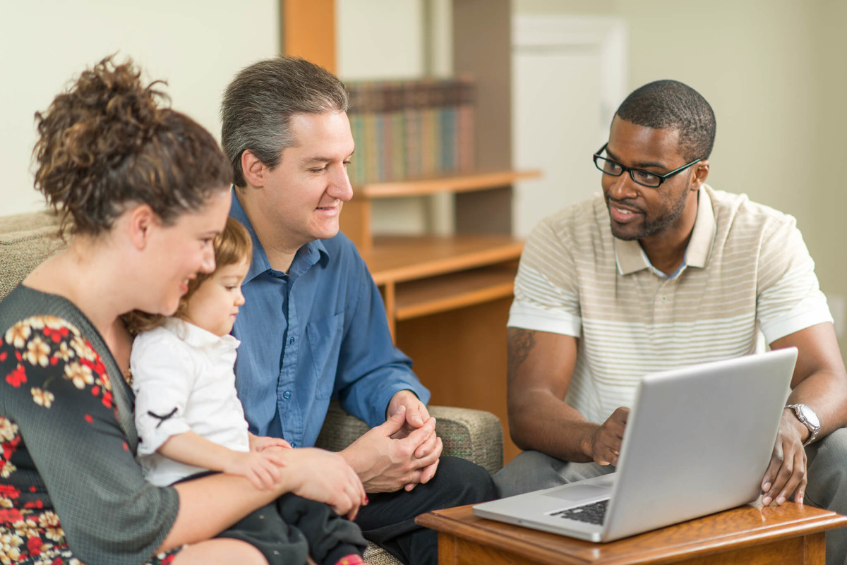 social worker helping family take control of their money