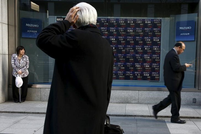 Asian shares fall after Fed rate hike, tracking Wall St lead