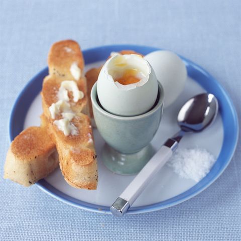 Soft-boiled eggs with rosemary and garlic fingers