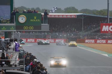 91 LIETZ Richard (aut), SCHURING Morris (nld), SHAHIN Yasser (aus), Manthey EMA, Porsche 911 GT3 R #91, LM GT3, FIA WEC, finish line, arrivee, during the podium of the 2024 24 Hours of Le Mans, 4th round of the 2024 FIA World Endurance Championship, on the Circuit des 24 Heures du Mans, from June 15 to 16, 2024 in Le Mans, France - Photo Javier Jimenez / DPPI