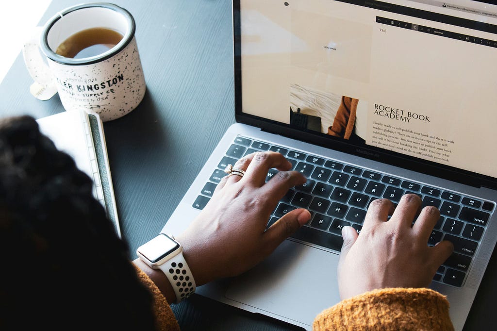 A writer creating a blog post for a website