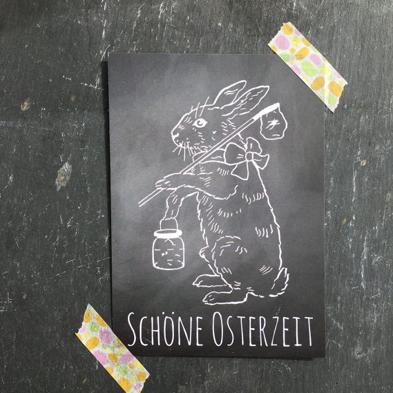 Schwarze Hasenkarte Schöne Osterzeit auf Schiefertafel