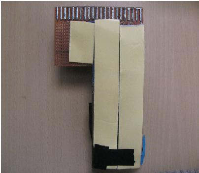 Imagem mostrando a antena de trilha PCB conectada à unidade transmissora