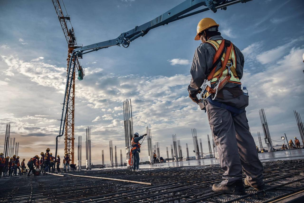 Teamwork at construction site Let's build