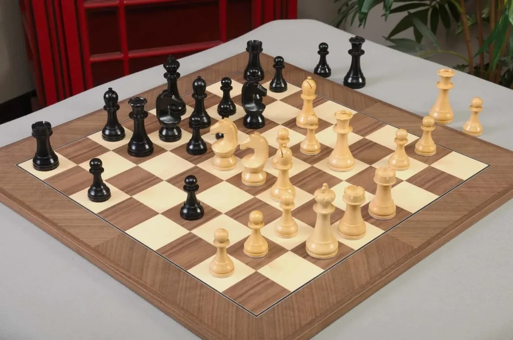 A chess game in progress on tournament chess set.