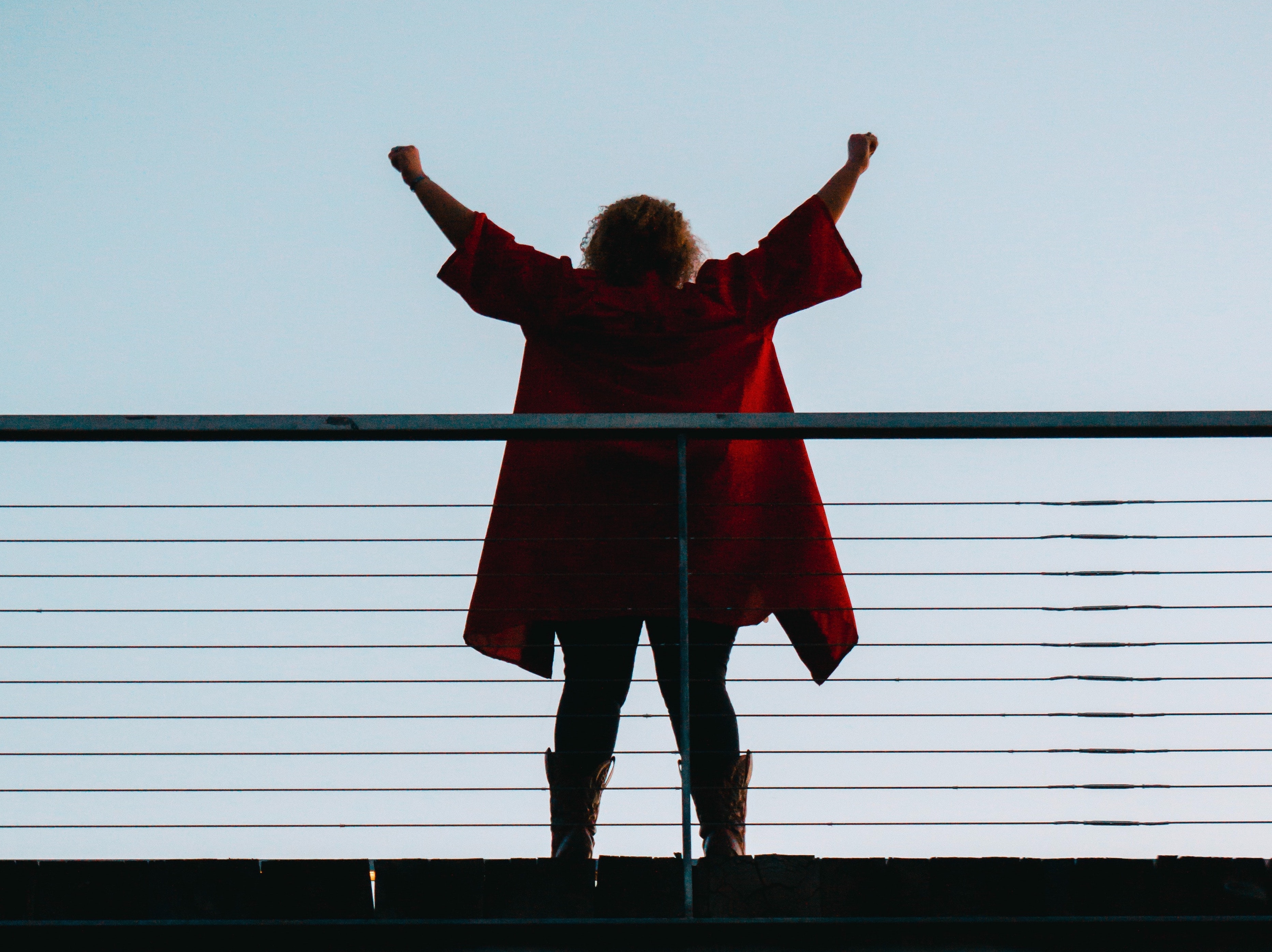 Woman in celebration pose