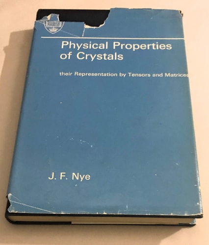 Physical Properties of Crystals: Their Representation by Tensors and Matrices