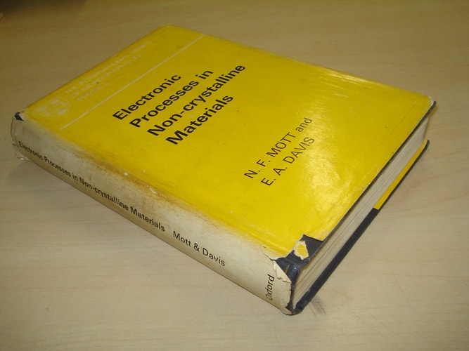 Electronic Processes in Non-Crystalline Materials