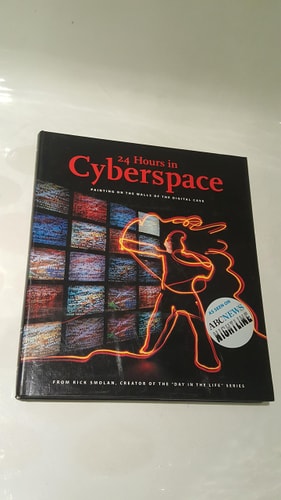 24 Hours in Cyberspace: Painting on the Walls of the Digital Cave Photographed on One Day by 150 of the World's Leading Photojournalists