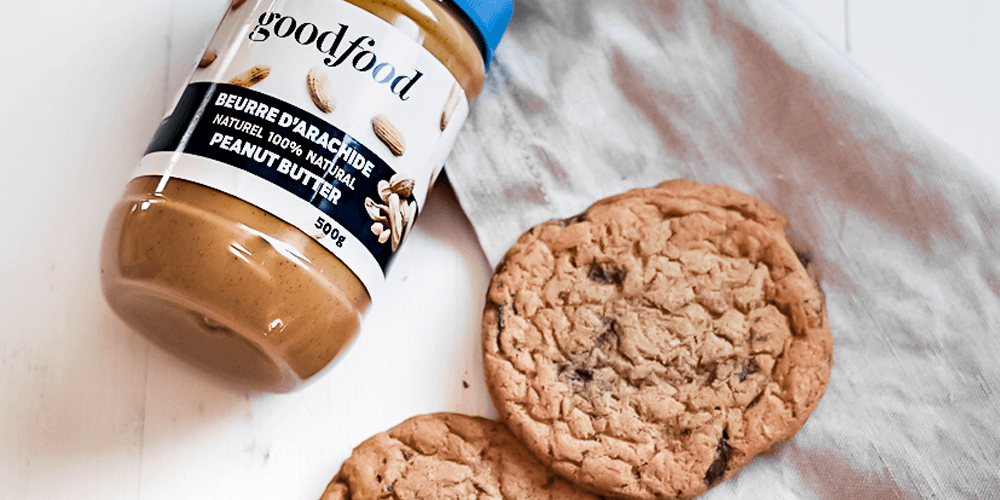 Goodfood Natural Peanut Butter next to peanut butter cookies