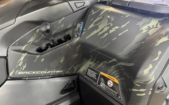 2026 Can-Am® Outlander Backcountry 1000R Multicam Dark Camo