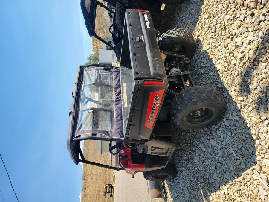 2009 POLARIS 4X4,700 EFI, SOLAR RED Solar Red - UU5436