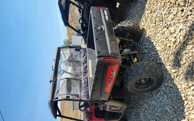 2009 POLARIS 4X4,700 EFI, SOLAR RED Solar Red - UU5436