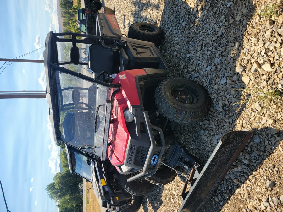 2009 POLARIS 4X4,700 EFI, SOLAR RED Solar Red - UU5436