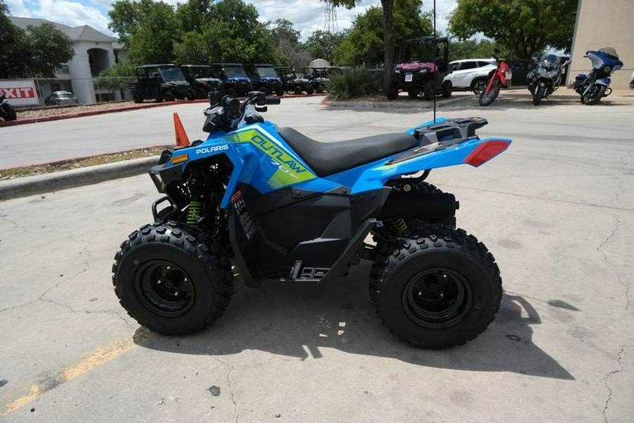 New 2025 POLARIS OUTLAW 70 EFI VELOCITY BLUE AND LIFTED LIME