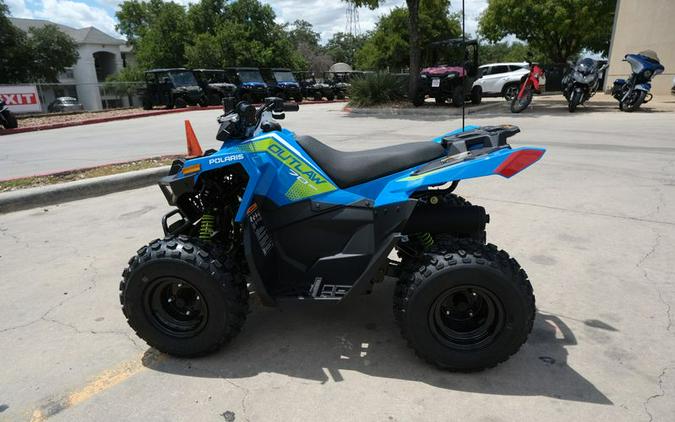 New 2025 POLARIS OUTLAW 70 EFI VELOCITY BLUE AND LIFTED LIME