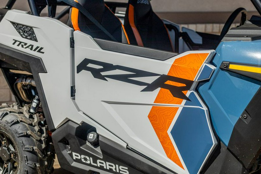 New 2024 POLARIS RZR TRAIL ULTIMATE STORM BLUE AND WHITE LIGHTNING