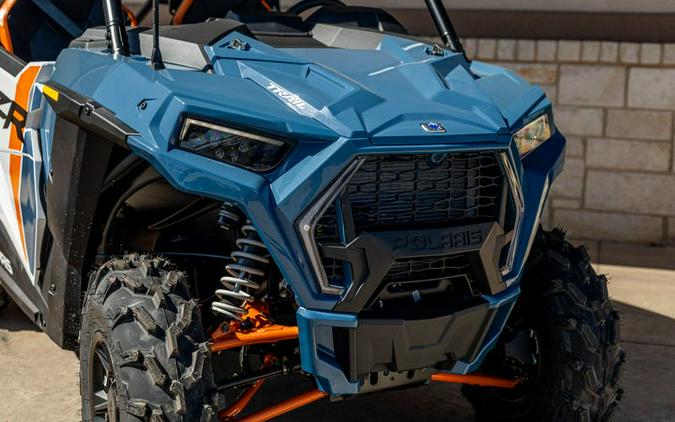 New 2024 POLARIS RZR TRAIL ULTIMATE STORM BLUE AND WHITE LIGHTNING